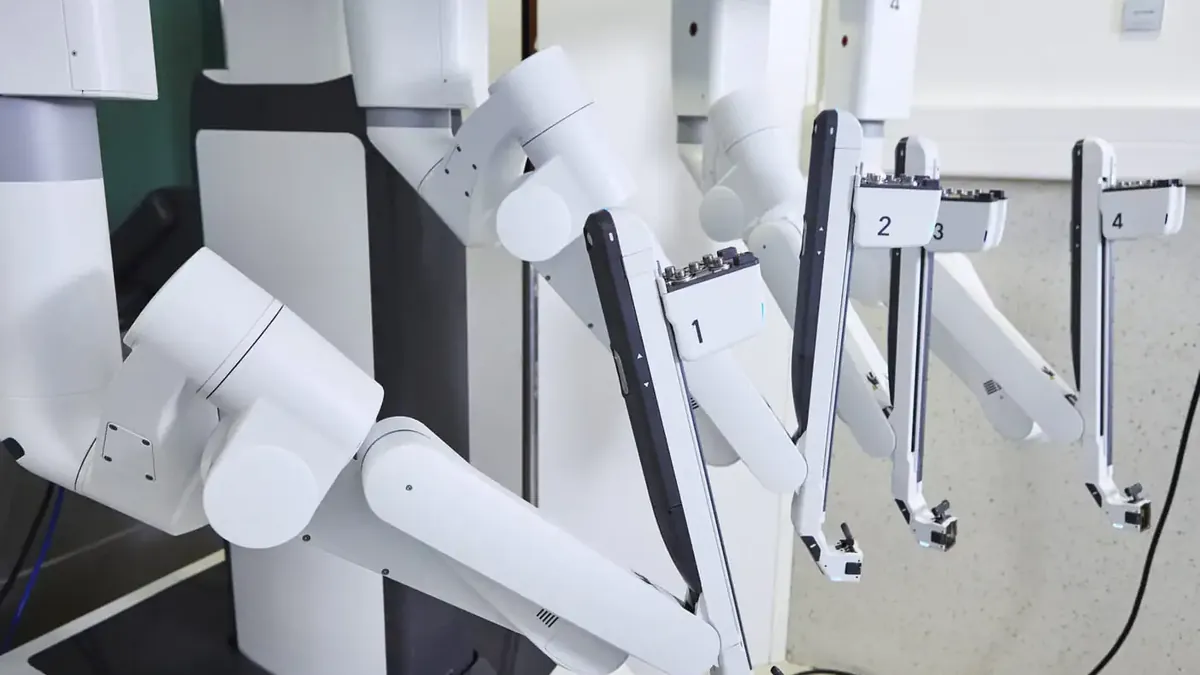 Articulated arms of the Da Vinci Xi surgical robot in the operating room
