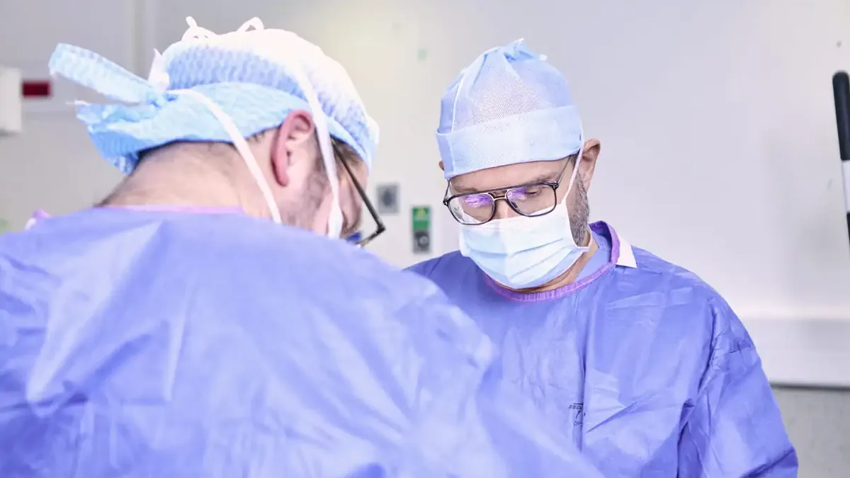 Surgical team in the operating room during a robot-assisted prostatectomy